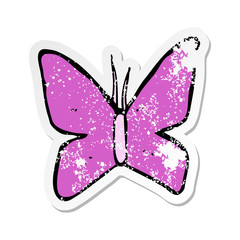 retro distressed sticker of a cartoon butterfly symbol