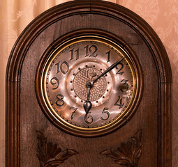 close-up of the dial of the old clock. pink tinted