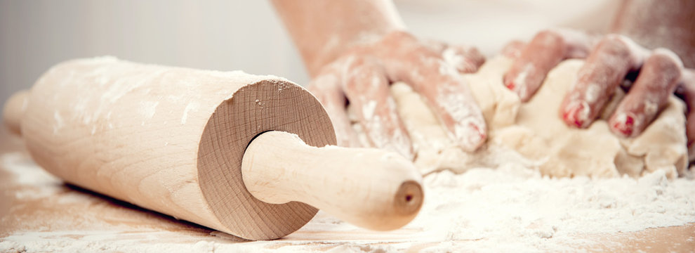 Woman Kneading Dough Close Up Horizontal Image