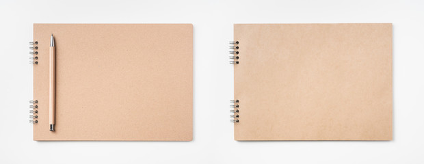 kraft notebook and pen on white background