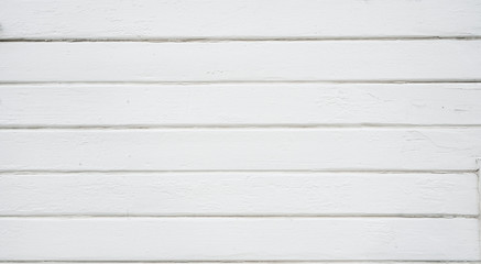 Fototapeta premium Rustic painted wood wall or siding. Peeling white paint with light neutral flat faded tones.