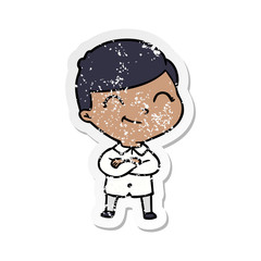 distressed sticker of a cartoon boy smiling