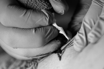 close up of tattoo gun