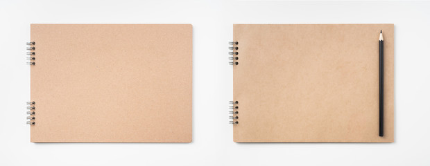 kraft notebook and pen on white background