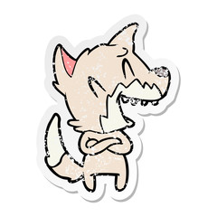 distressed sticker of a laughing fox cartoon