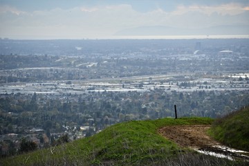 A scenic hiking trail from nature overlooking the city