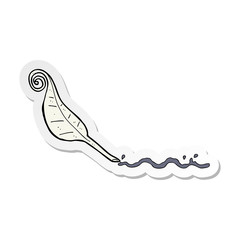 sticker of a cartoon feather quill