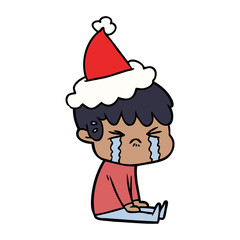 line drawing of a boy crying wearing santa hat