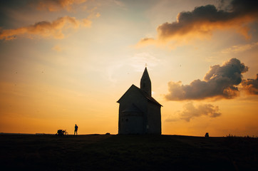 Silhouette of Romanesque church Saint Michael, Drazovce, Slovakia