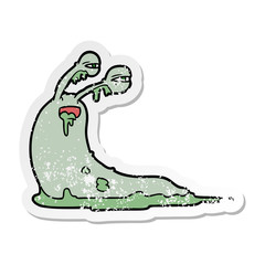 distressed sticker of a gross cartoon slug