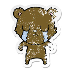 distressed sticker of a crying cartoon bear