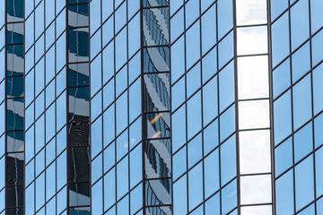 Obraz premium Detail of a Glass Office Building