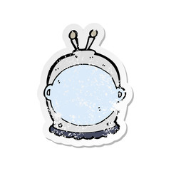 retro distressed sticker of a cartoon space helmet