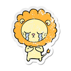distressed sticker of a crying cartoon lion