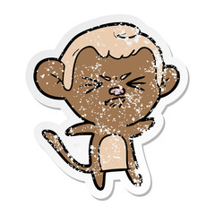 distressed sticker of a cartoon annoyed monkey