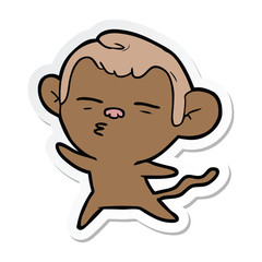 sticker of a cartoon suspicious monkey