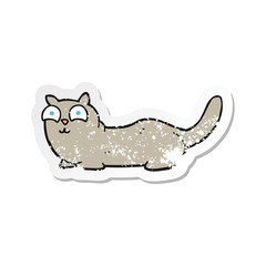 retro distressed sticker of a cartoon cat