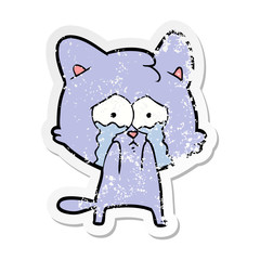 distressed sticker of a cartoon crying cat