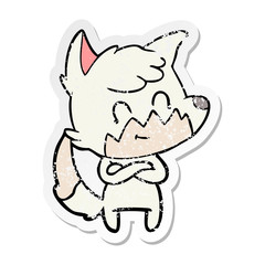 Obraz premium distressed sticker of a cartoon friendly fox