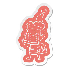 cartoon  sticker of a man crying wearing santa hat