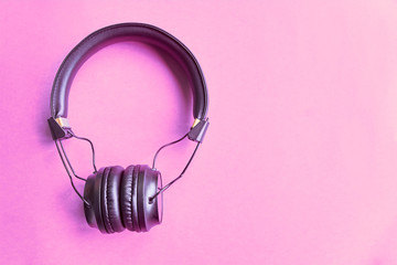 Headphones on colorful background.