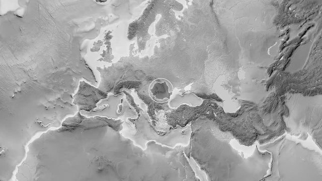 Romania area presented against the global grayscale map in the Kavrayskiy VII projection with animated oblique transformation
