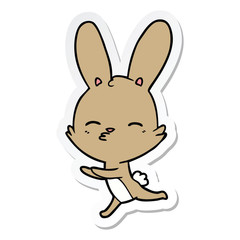 sticker of a curious bunny cartoon