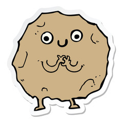 sticker of a cartoon rock character