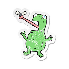 retro distressed sticker of a cartoon frog catching fly