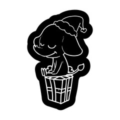 cartoon icon of a smiling elephant wearing santa hat