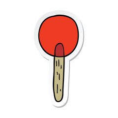 sticker of a cartoon candy lollipop