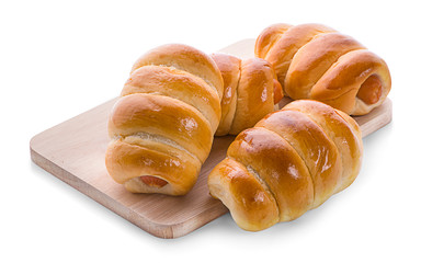 Sausage in dough .Isolated on white background