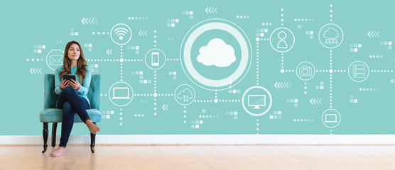 Cloud computing with young woman holding a tablet computer