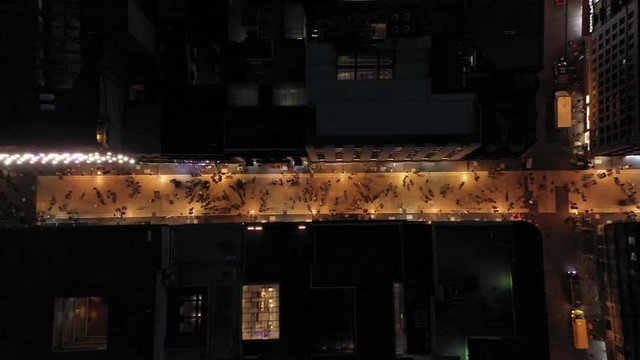 Mexico CIty Madero pedestrian street at night. With people walking doing Christmas shopping.