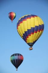 Three hot air balloons in the sky