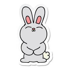 sticker of a quirky hand drawn cartoon rabbit