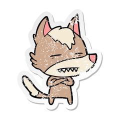 distressed sticker of a cartoon wolf showing teeth