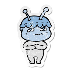 distressed sticker of a friendly cartoon spaceman