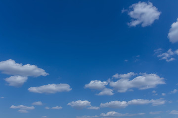 The blue sky and white clouds indicate pure and freshing