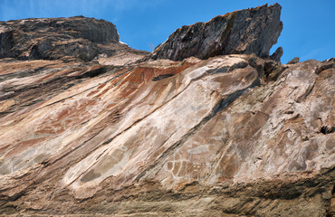 Ancient people Petroglyphs on the rocks on the bank of river Tom in West Siberia