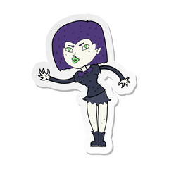 sticker of a cartoon vampire girl