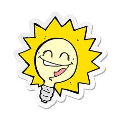 sticker of a happy light bulb cartoon
