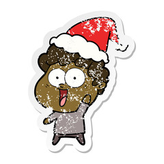 distressed sticker cartoon of a happy man wearing santa hat
