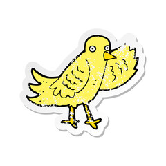 retro distressed sticker of a cartoon waving bird