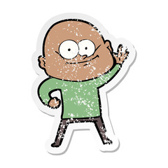 distressed sticker of a cartoon bald man staring