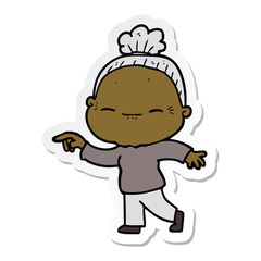 sticker of a cartoon peaceful old woman