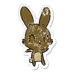 distressed sticker of a cute cartoon rabbit