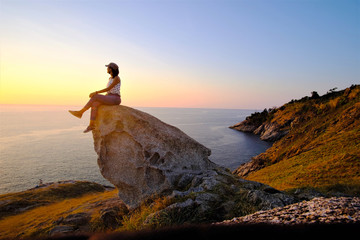 women sitting at viewpoint of Phuket, Thailand, Krating Cape