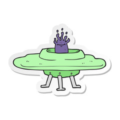 sticker of a cartoon flying saucer