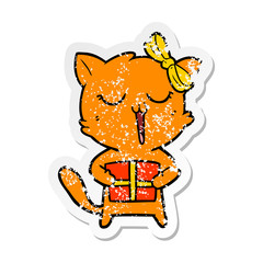 distressed sticker of a cartoon cat